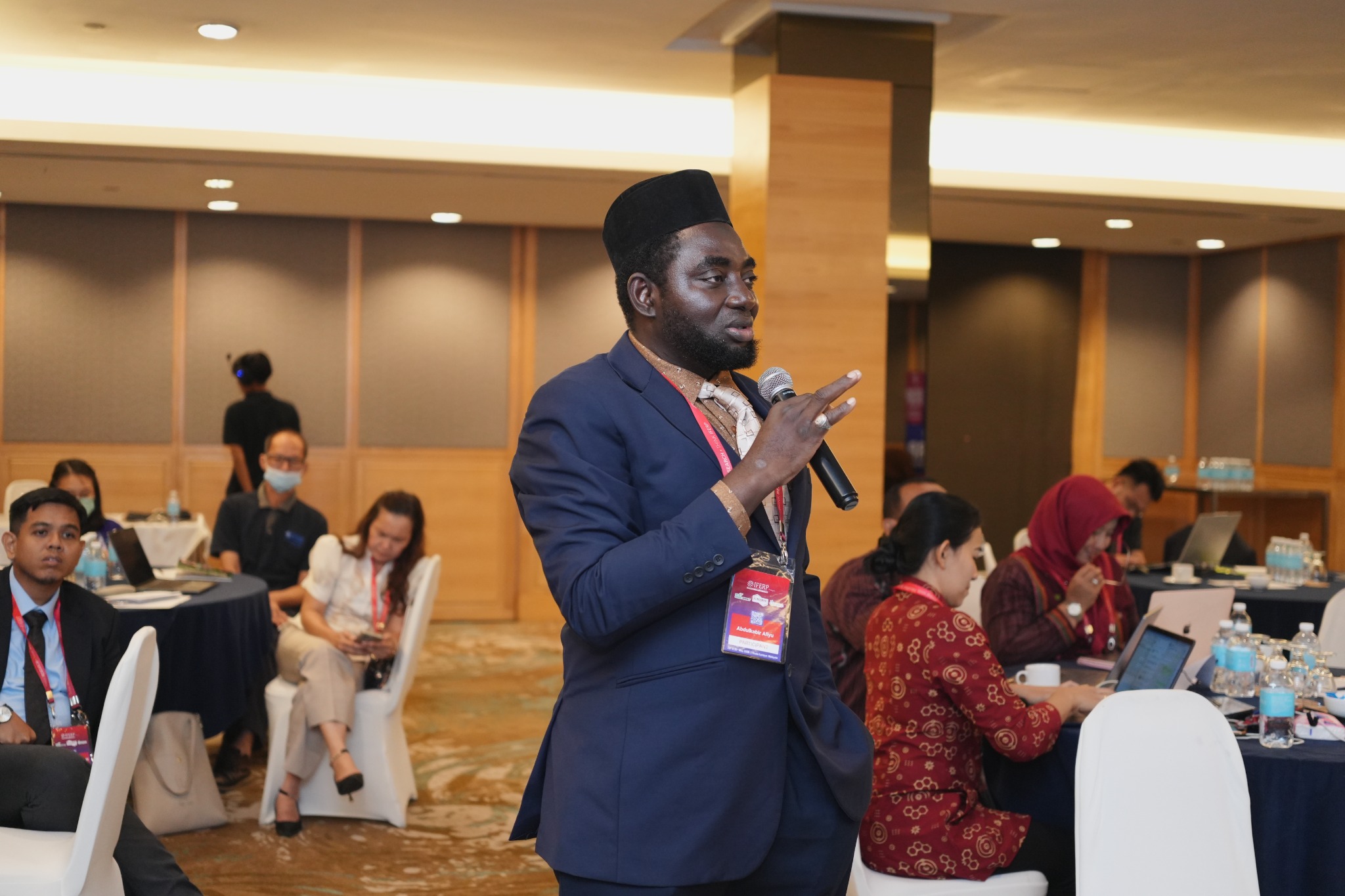 An author presenting to the room