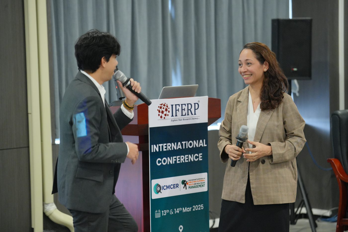 A speaker presenting at an IFERP session